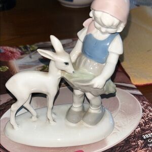 Porcelain Figurine of Child with Deer